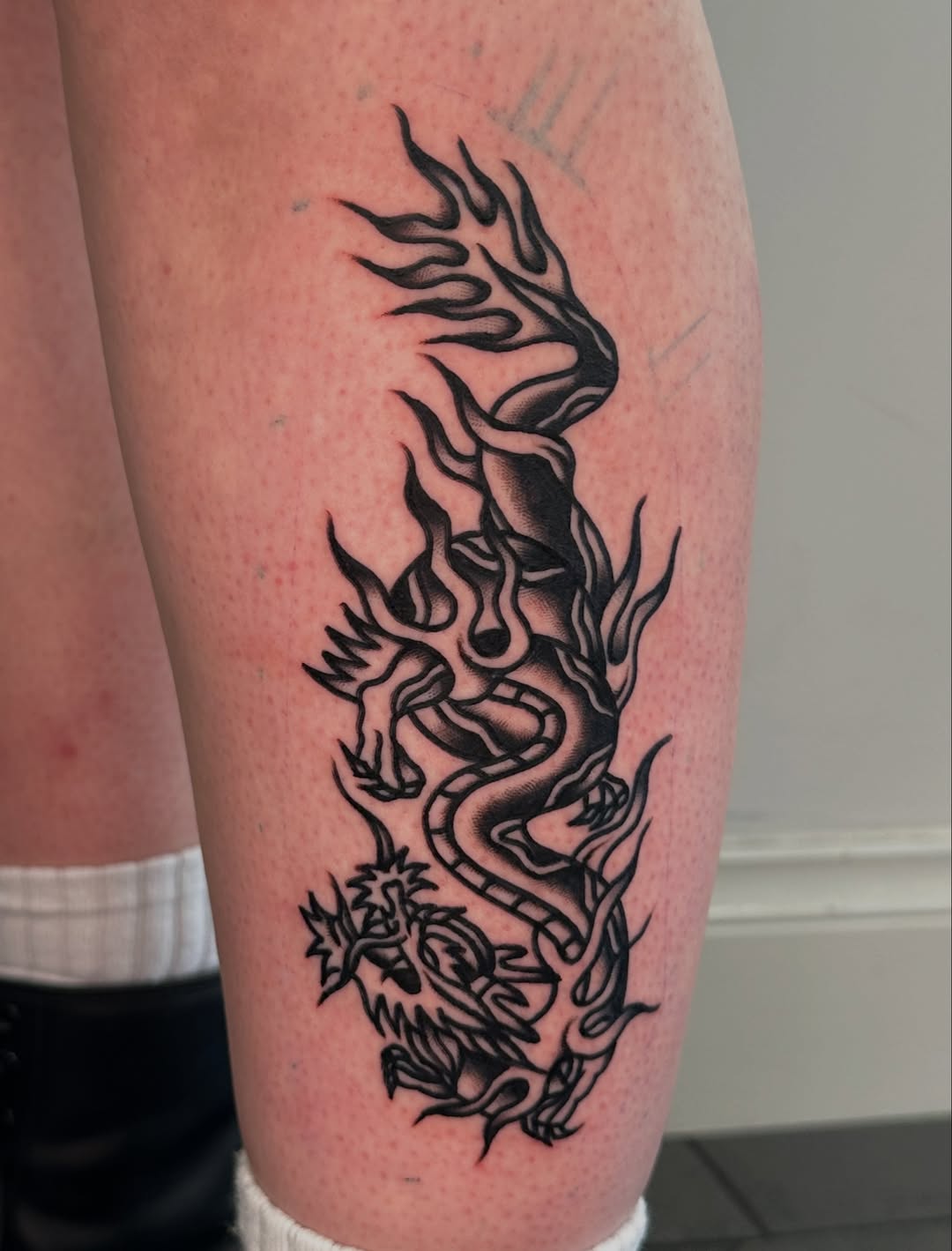 Tattoo by @koonta_tattoo — blackwork, black_and_grey