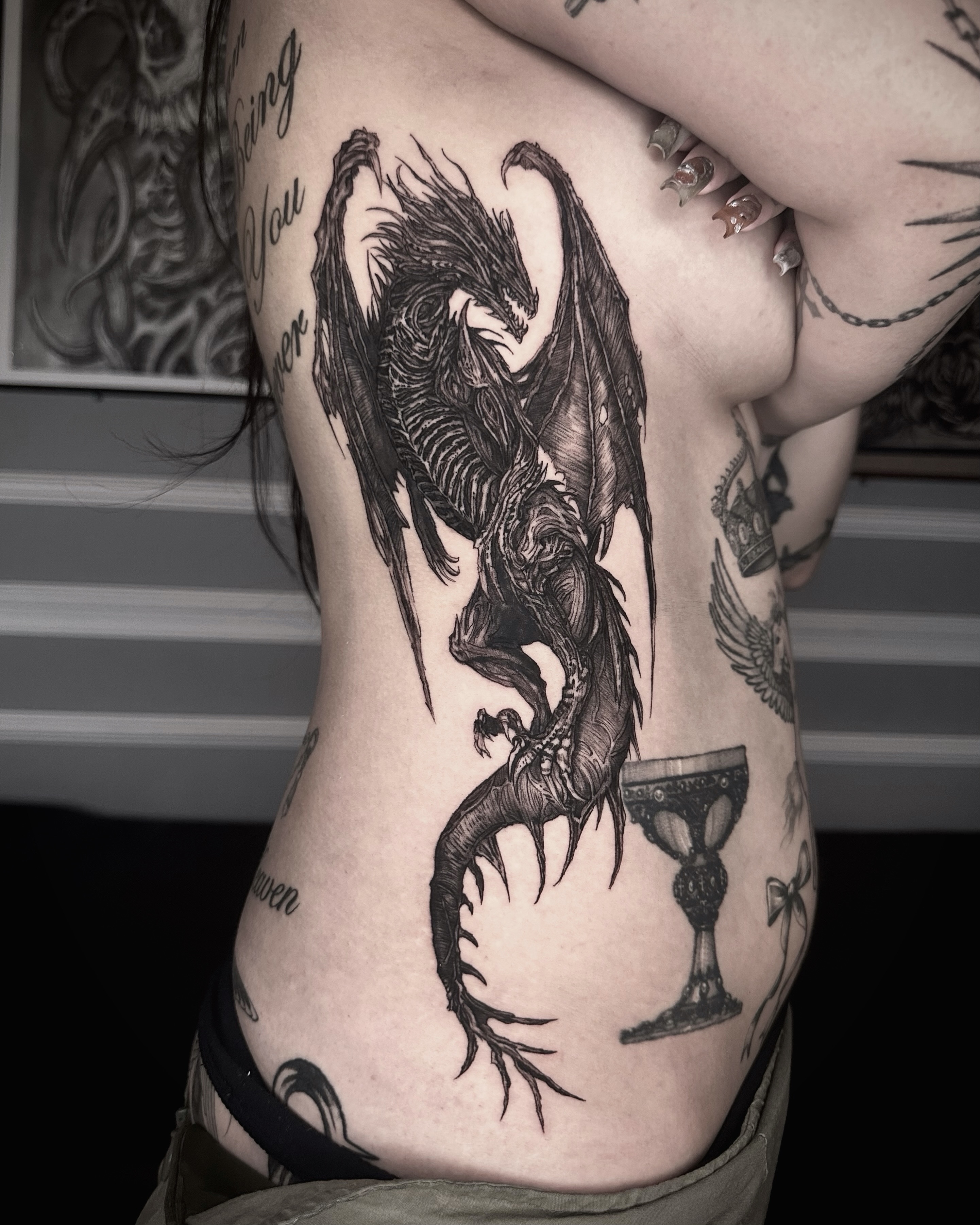 Tattoo by @gun_tattooist — dark_realism, black_and_grey