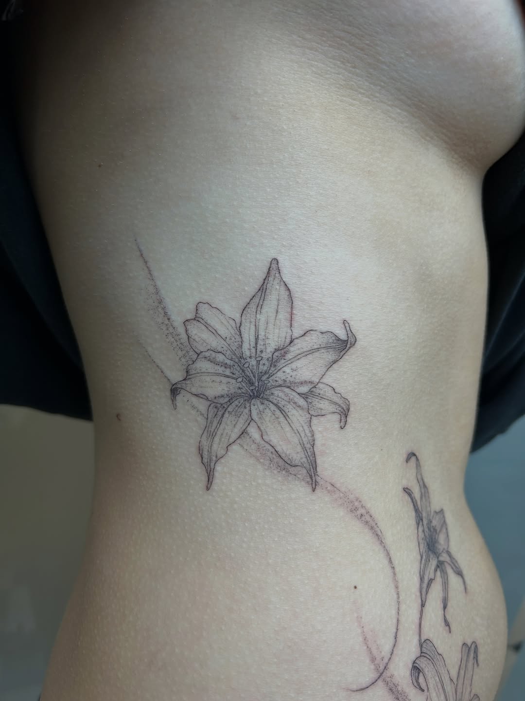 Tattoo by @leila.oko — fine_line, black_and_grey
