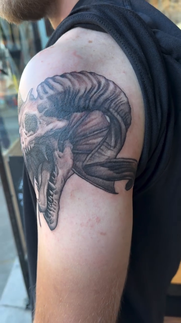 Tattoo by @rtist_ink — dark_realism, black_and_grey