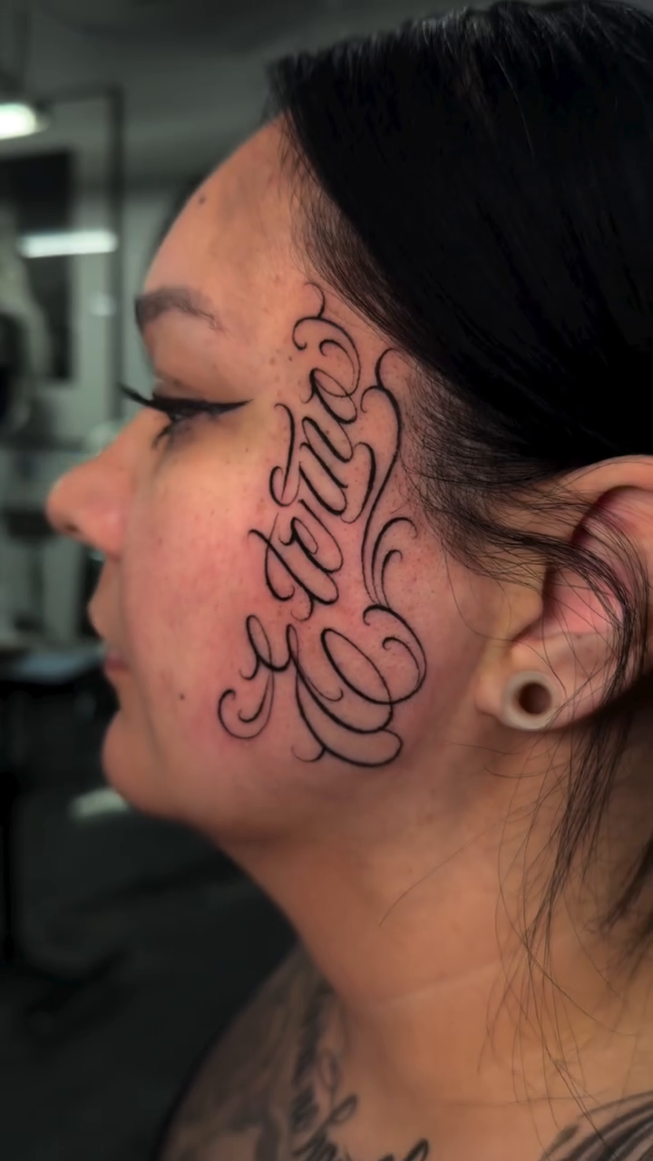 Tattoo by @stillballin6_ — lettering_script, chicano