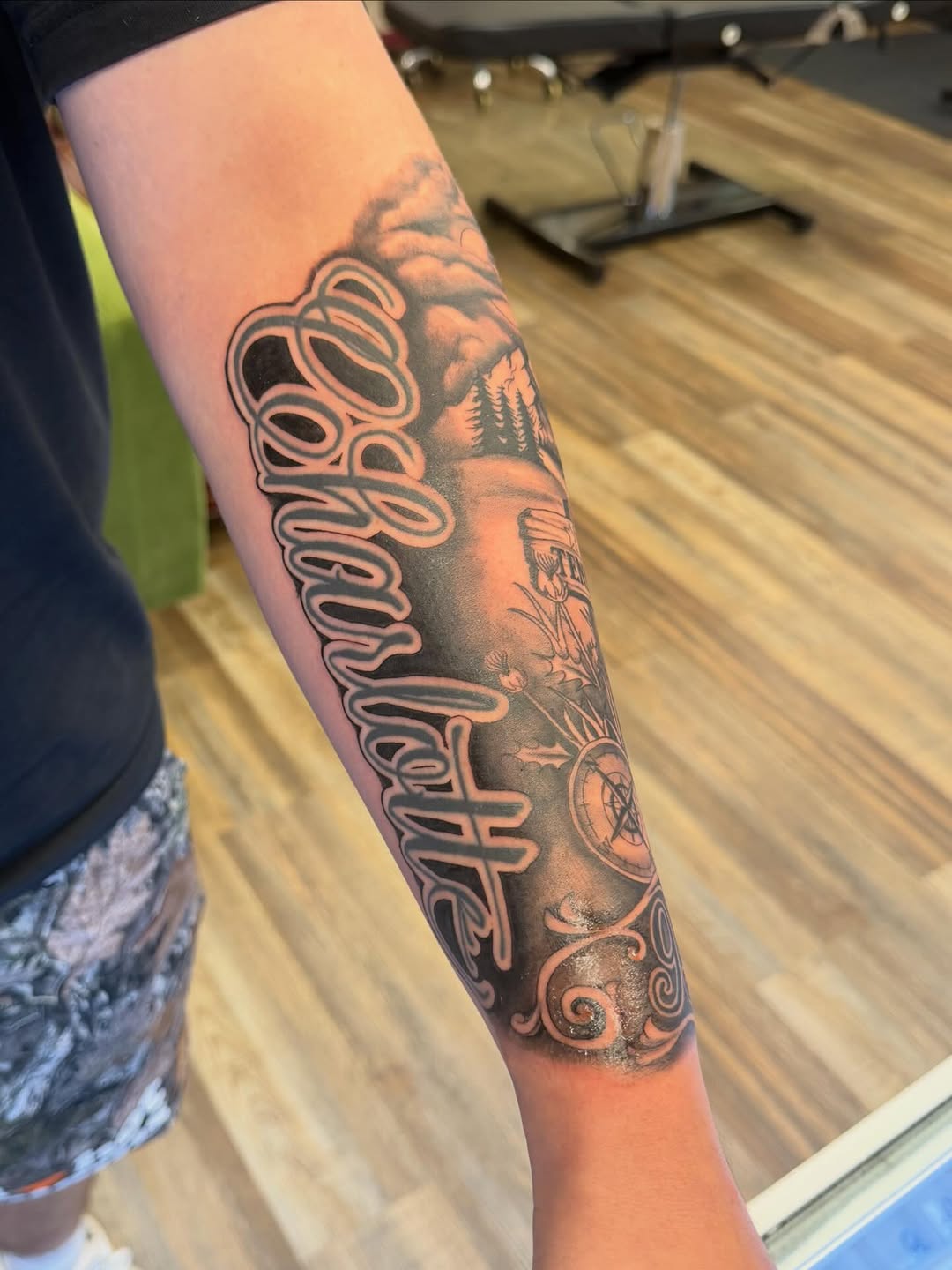 Tattoo by @hatchetfoot_art — lettering_script, black_and_grey