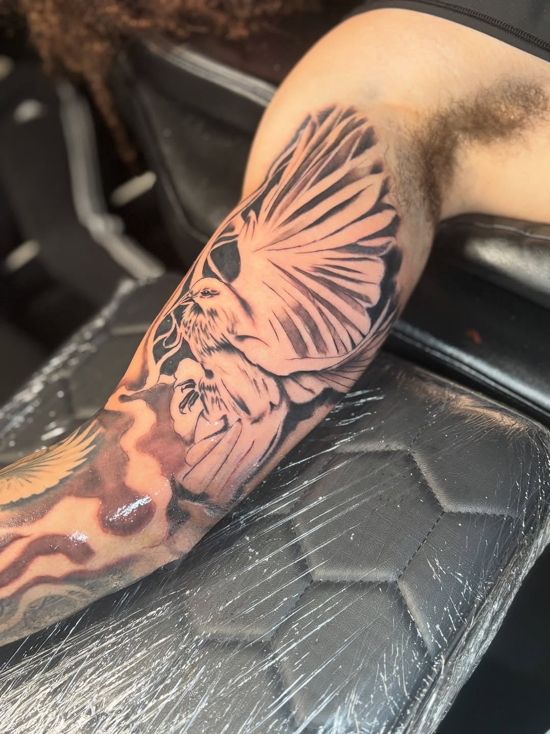 Tattoo by @tatboy_k — black_and_grey, realism