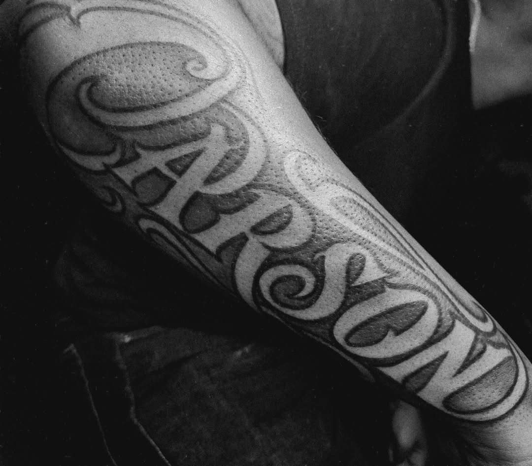 Tattoo by @infvmous.1 โ lettering_script, chicano