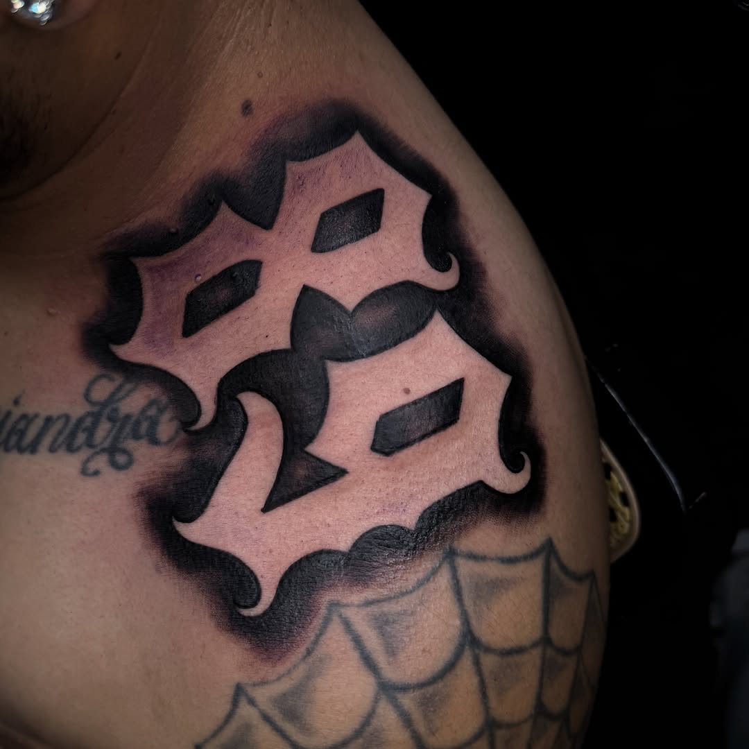 Tattoo by @tattsbymula — lettering_script, black_and_grey