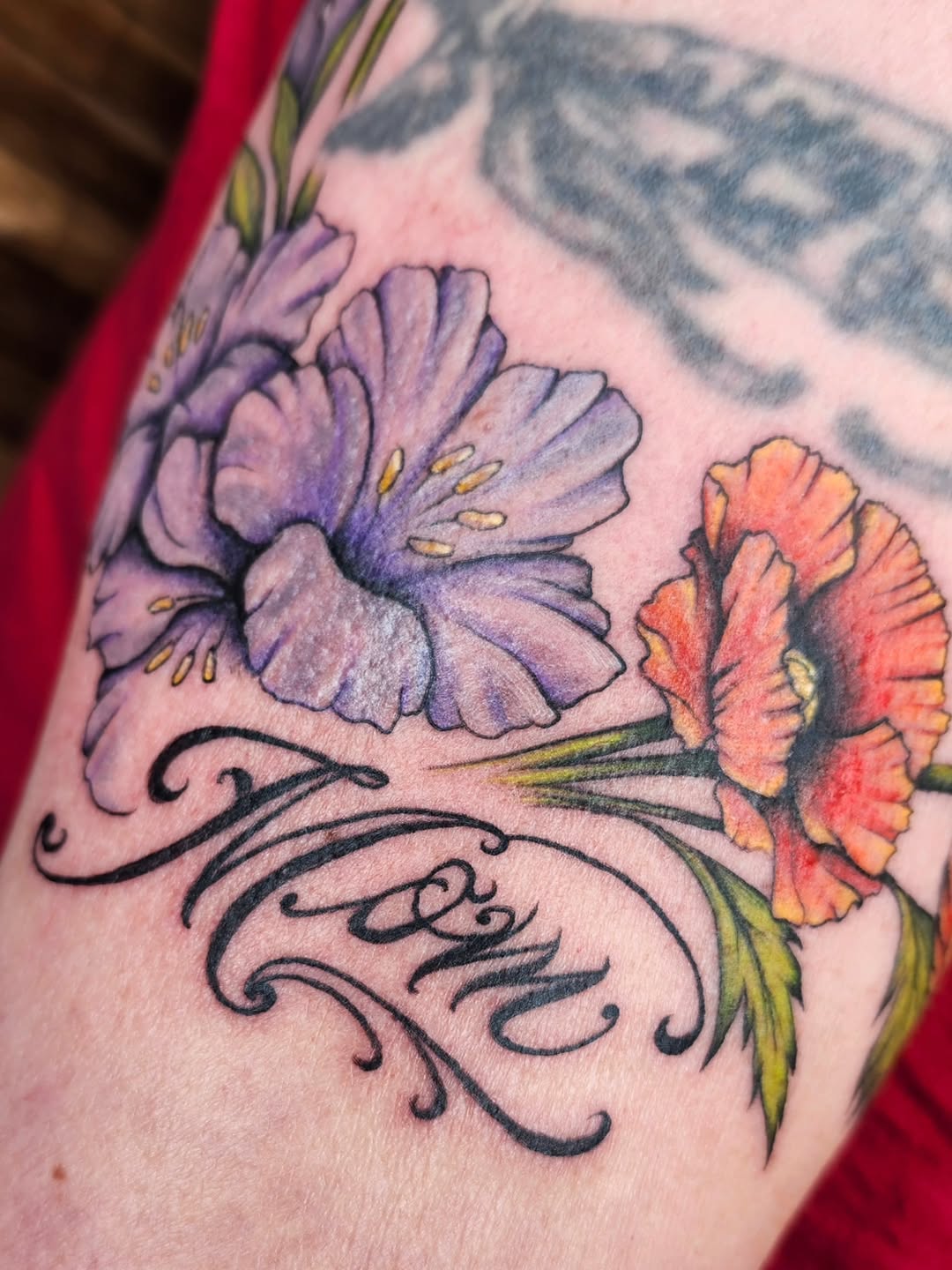 Tattoo by @kz.tattoos — illustrative, lettering_script