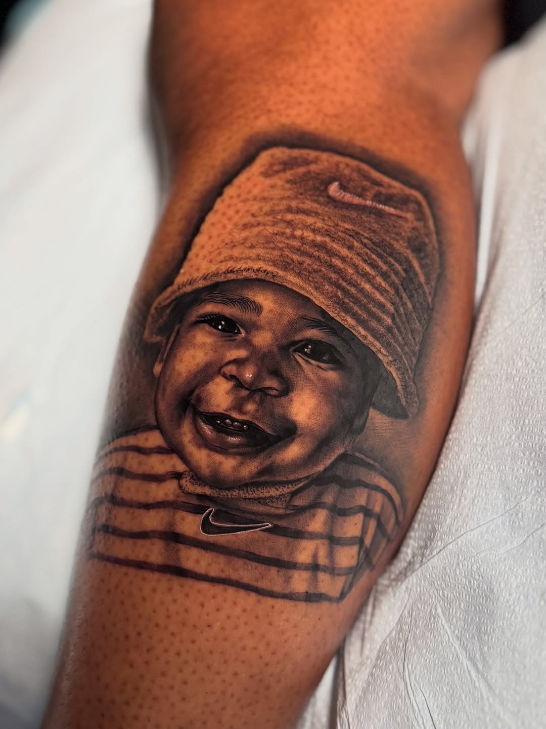 Tattoo by @heavyhitterbam — realism, black_and_grey