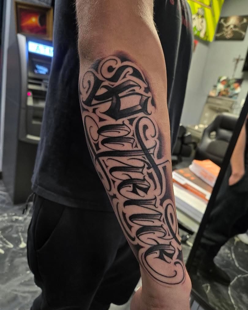 Tattoo by @diaztattoos — lettering_script, chicano