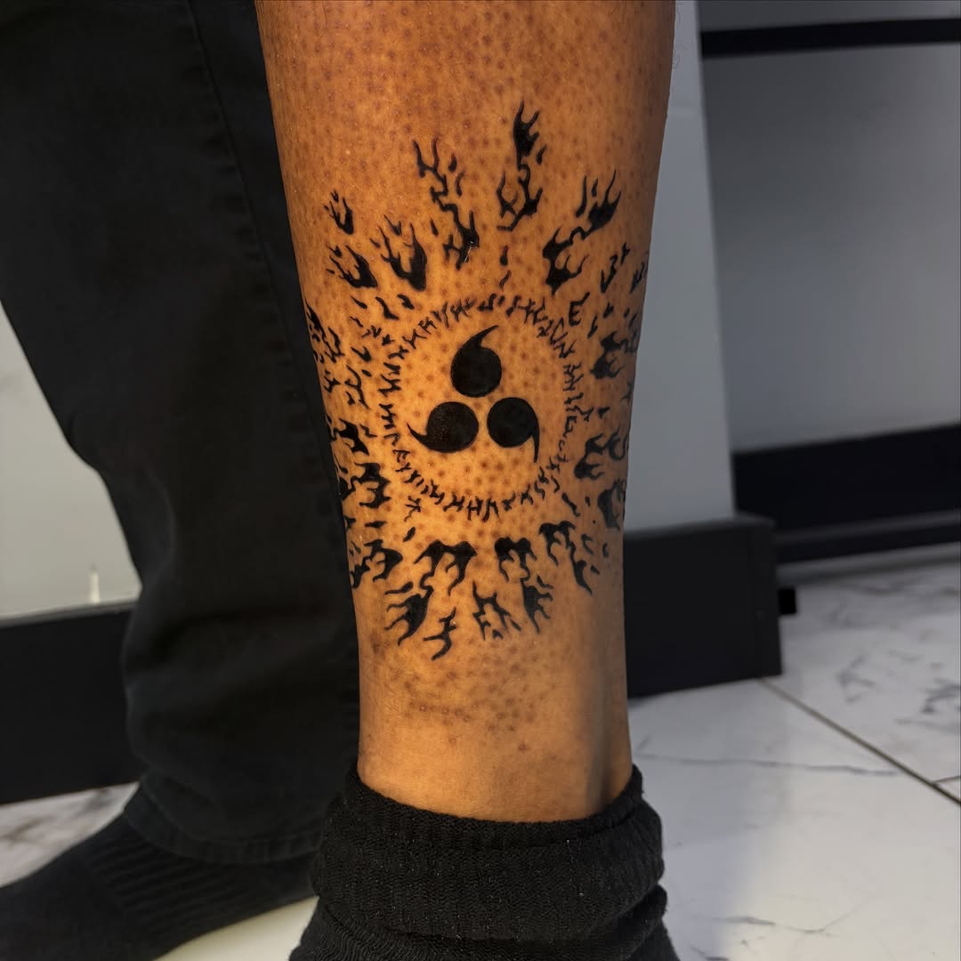 Tattoo by @vienna.tattoo — blackwork, anime