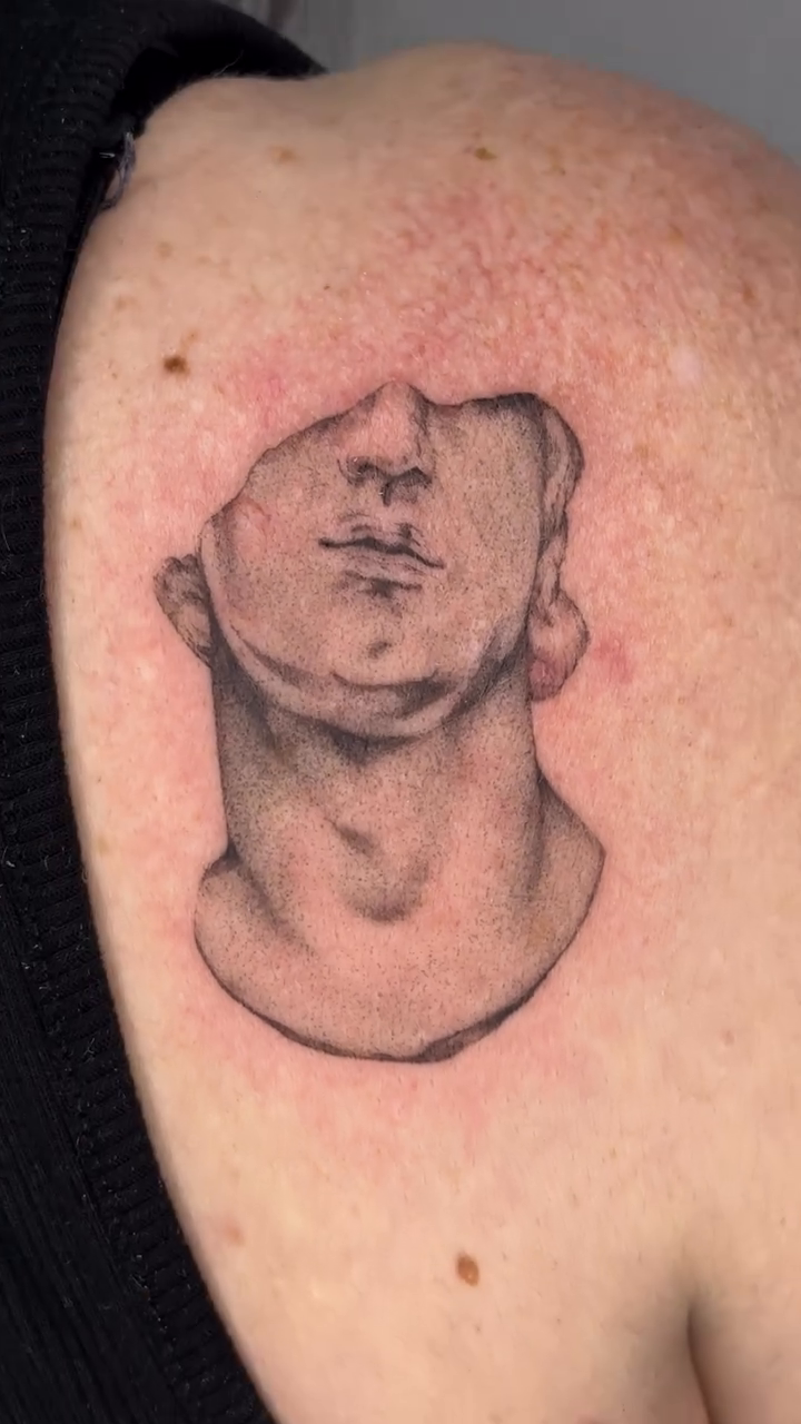 Tattoo by @emma.tattoos — realism, black_and_grey