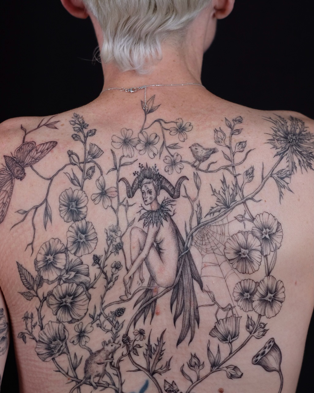 Tattoo by @sunpersimmon.tattoo — illustrative, black_and_grey