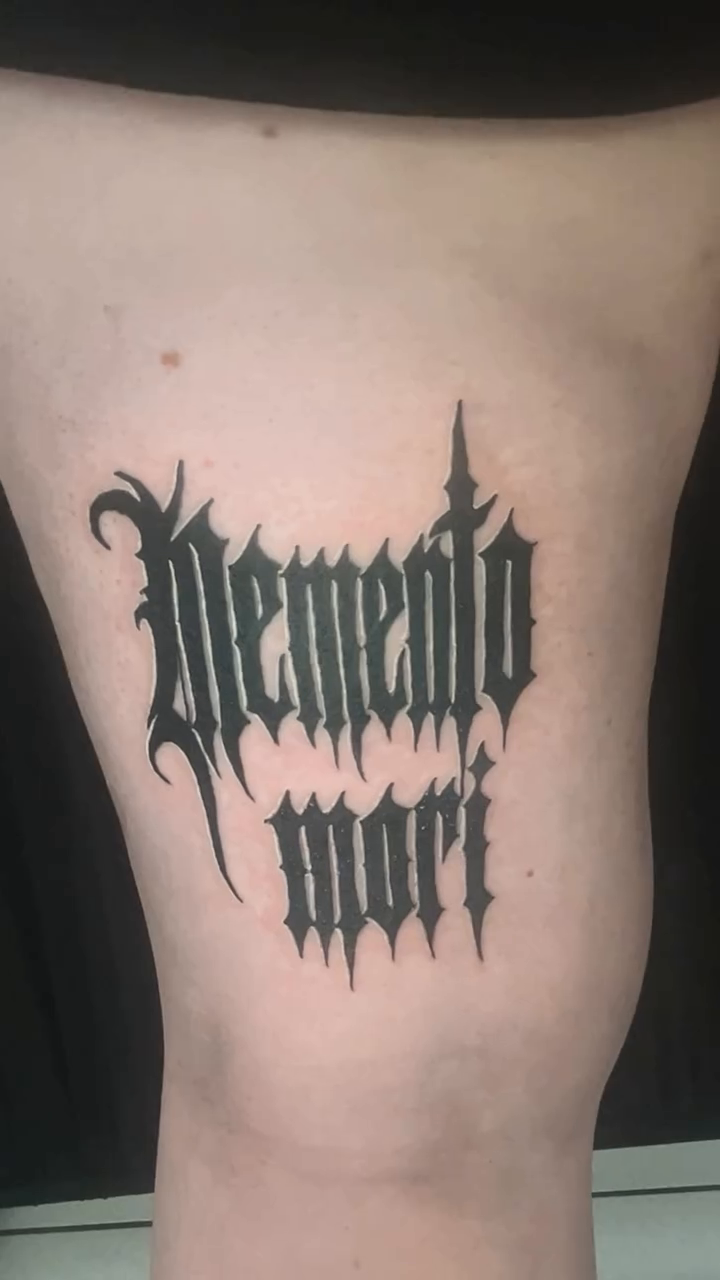 Tattoo by @amber_noir_tattoo โ lettering_script, blackwork