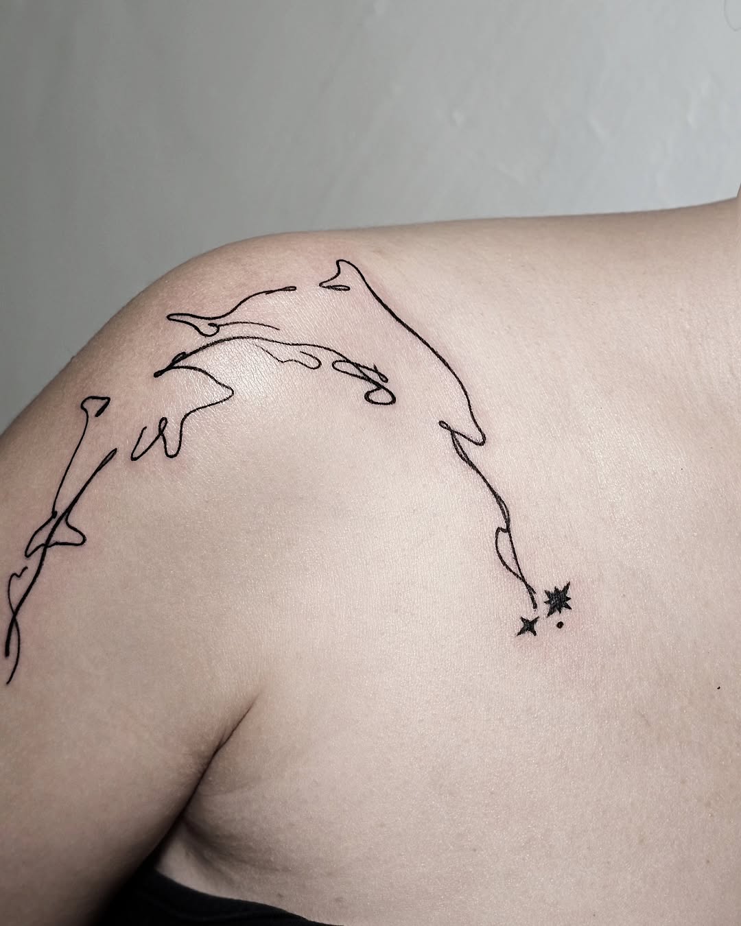 Tattoo by @draw.a_castle — fine_line, minimalist