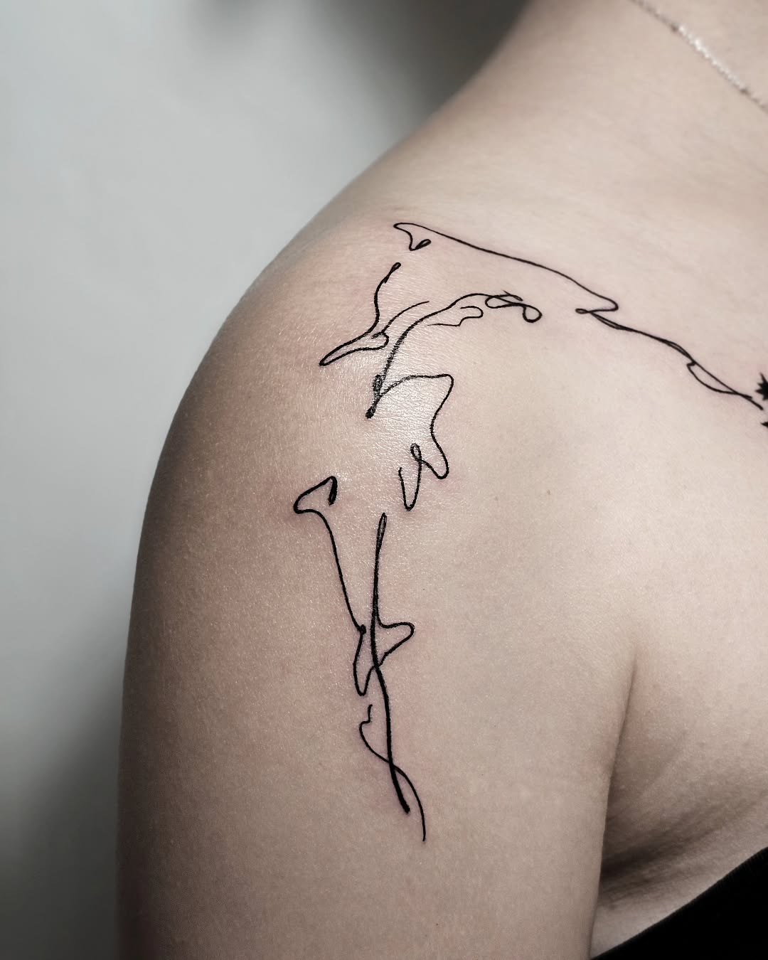 Tattoo by @draw.a_castle — fine_line, minimalist