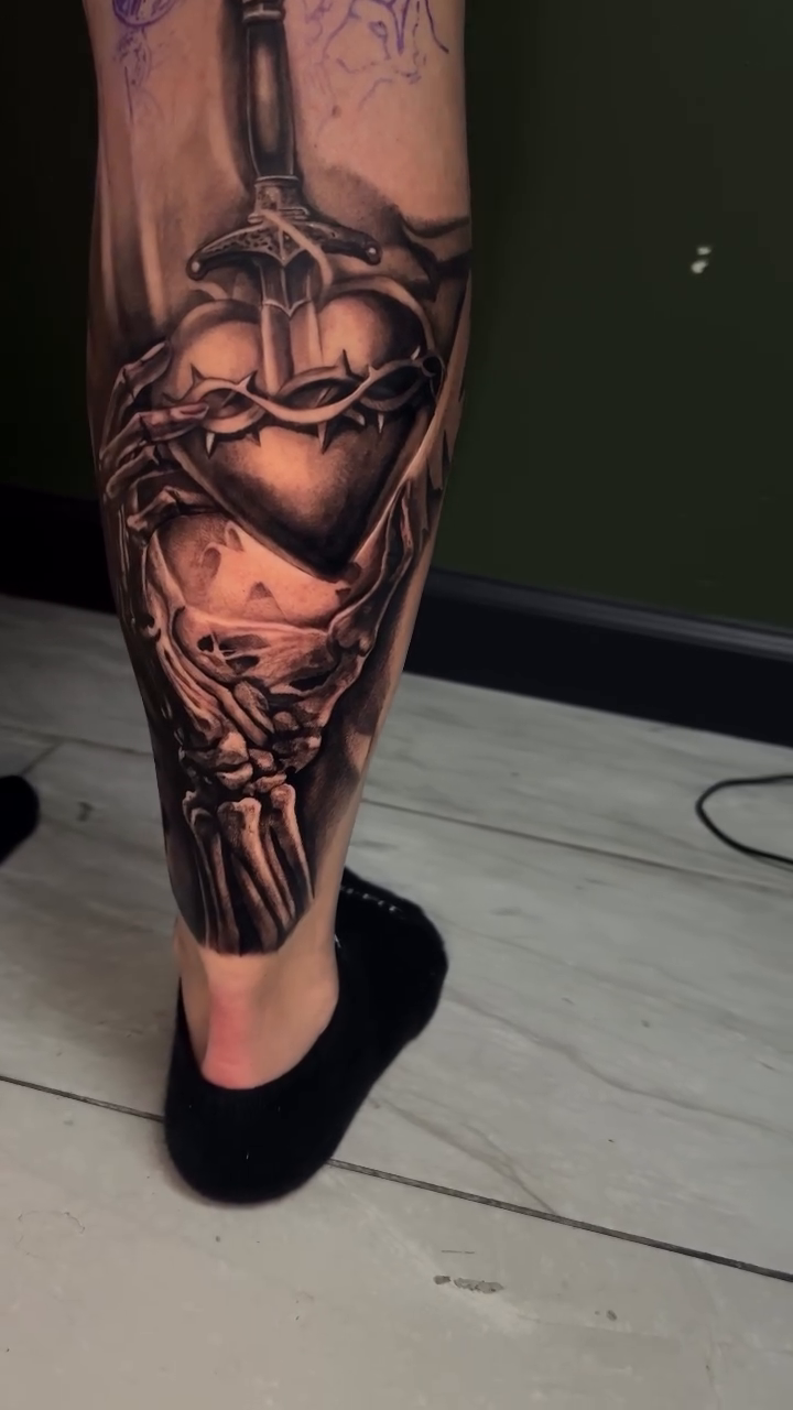 Tattoo by @the_buza — dark_realism, black_and_grey