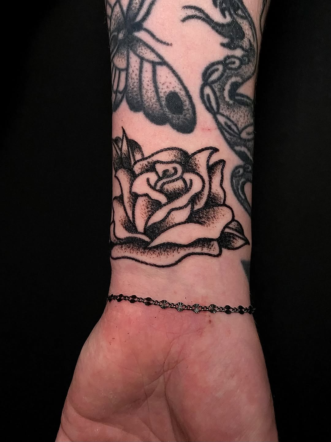 Tattoo by @cluelesstattoos — black_and_grey, dotwork
