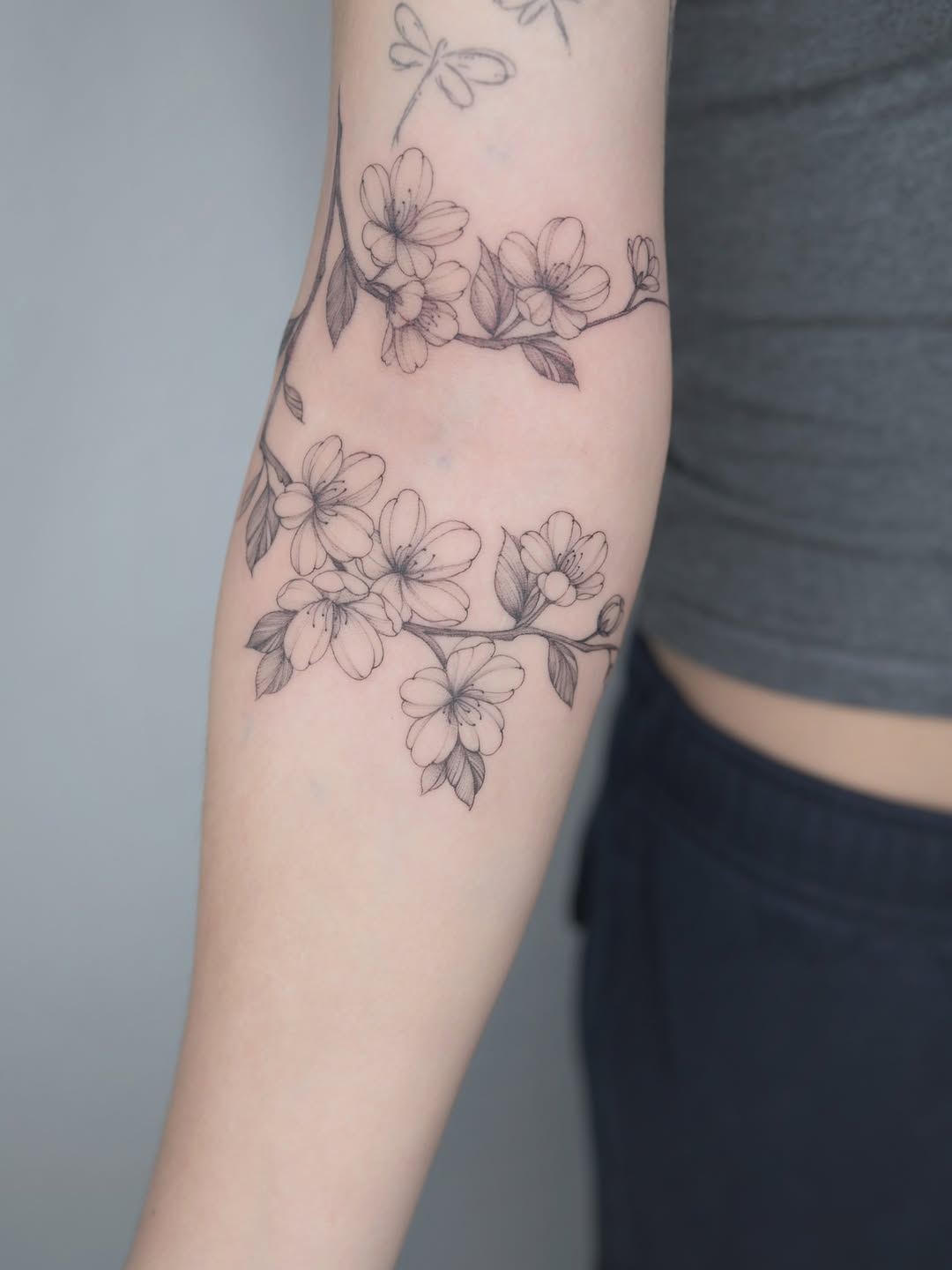 Tattoo by @a.ink.tattoo_mia — fine_line, black_and_grey