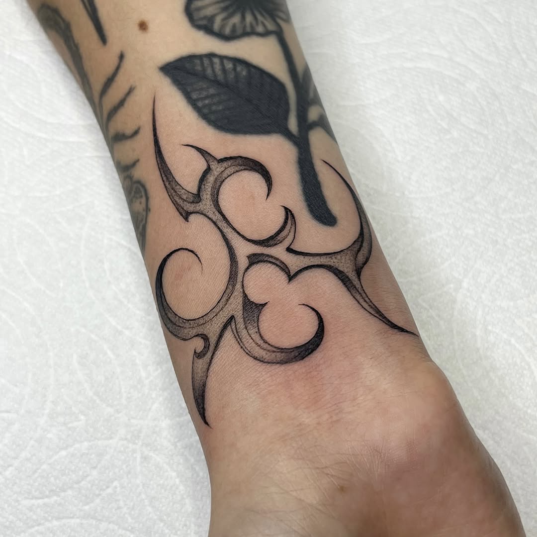 Tattoo by @sara_atamian_tattoos — tribal, black_and_grey