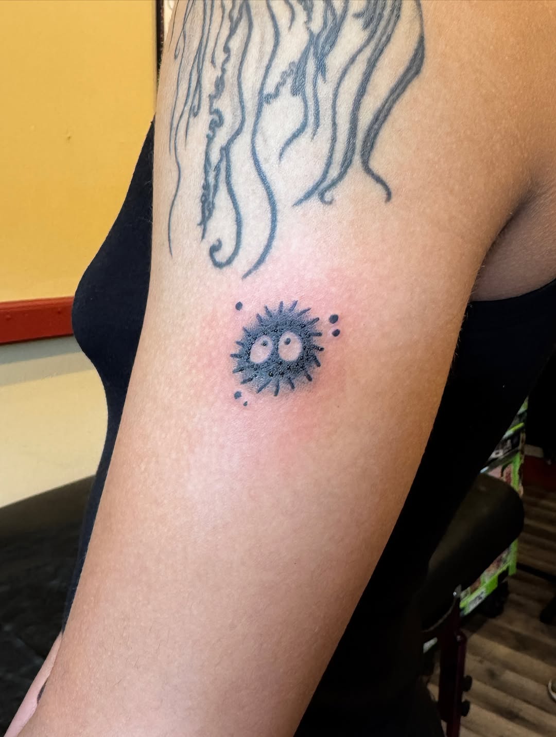 Tattoo by @cam.feraltattoos — blackwork, minimalist