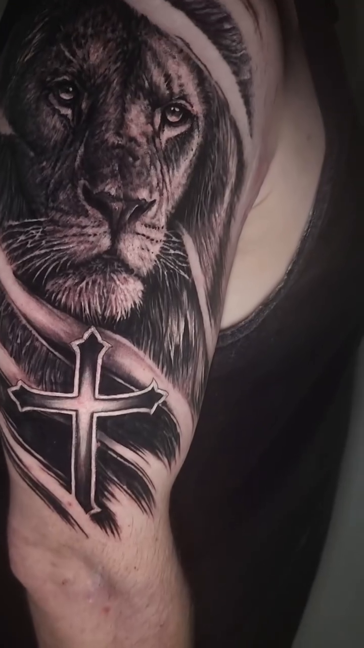 Tattoo by @zachmullinstattoos โ realism, black_and_grey