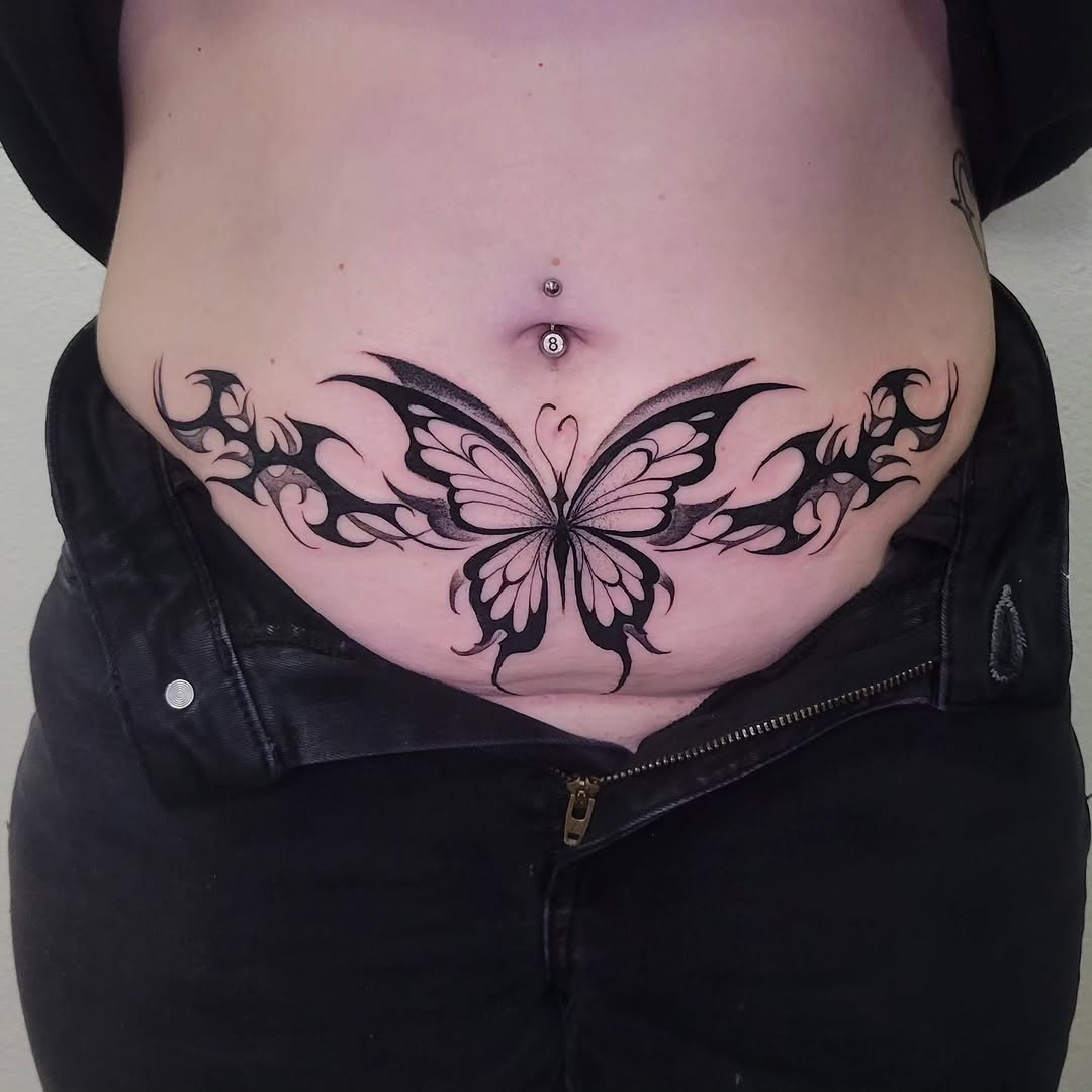 Tattoo by @totally.tattoo — blackwork, tribal