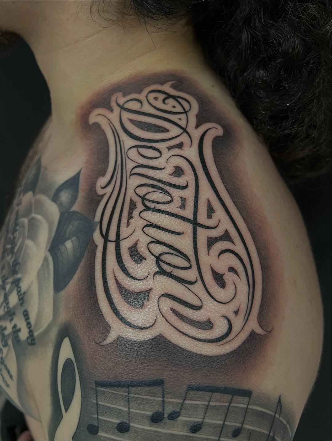 Tattoo by @guero_thomas — lettering_script, black_and_grey