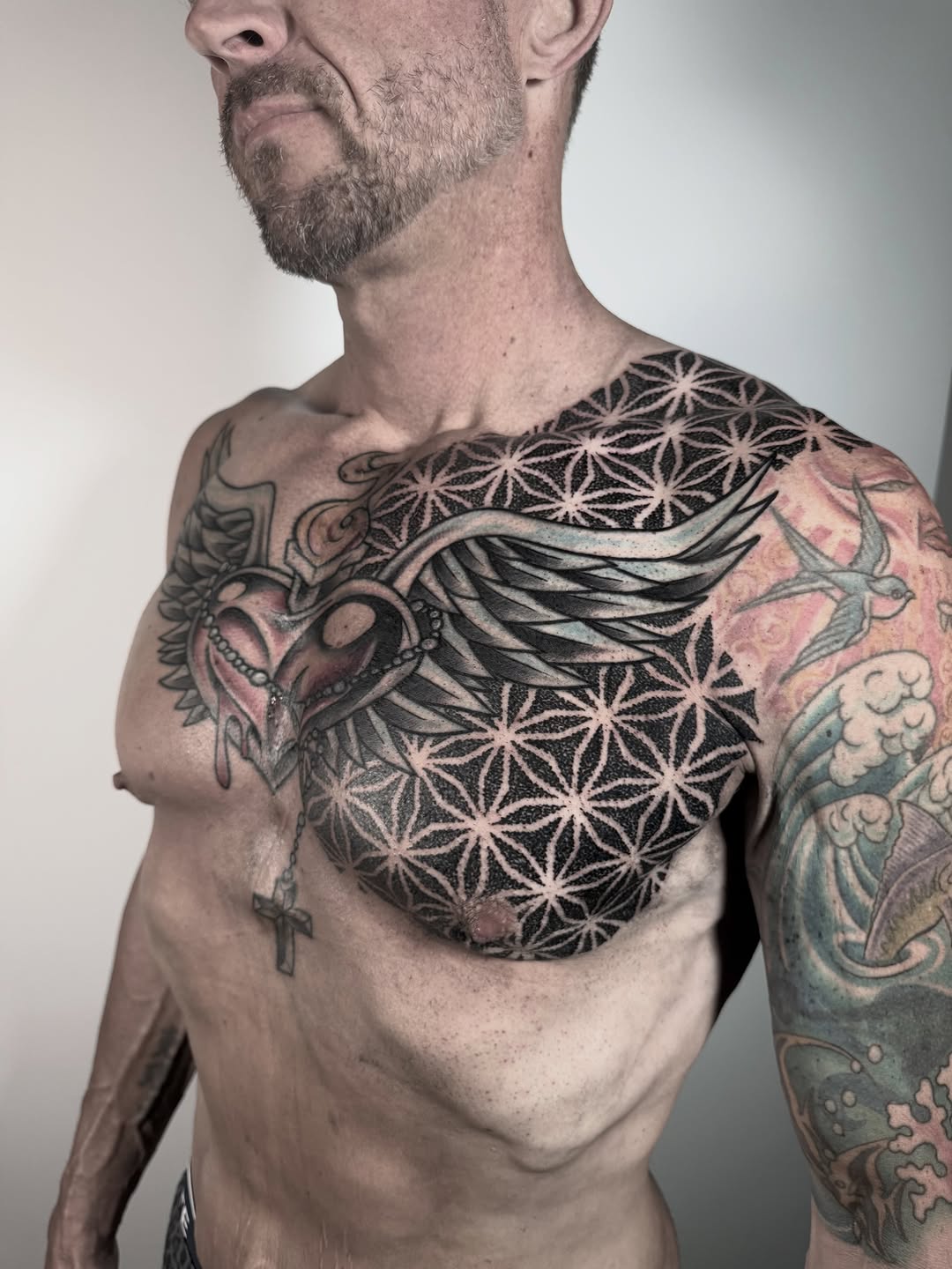 Tattoo by @ericharetattoo — geometric, dotwork