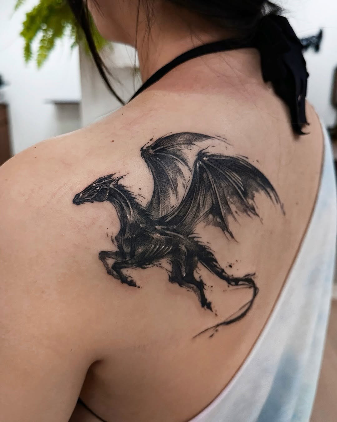 Tattoo by @uzo.ink — black_and_grey, realism