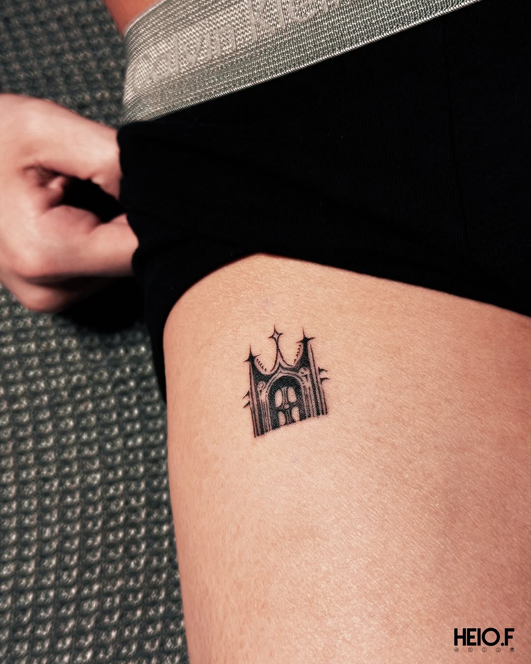 Tattoo by @heio.f — fine_line, black_and_grey