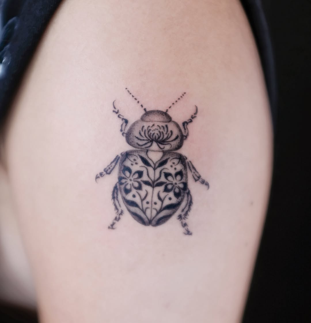 Tattoo by @eyu.tats โ black_and_grey, ornamental