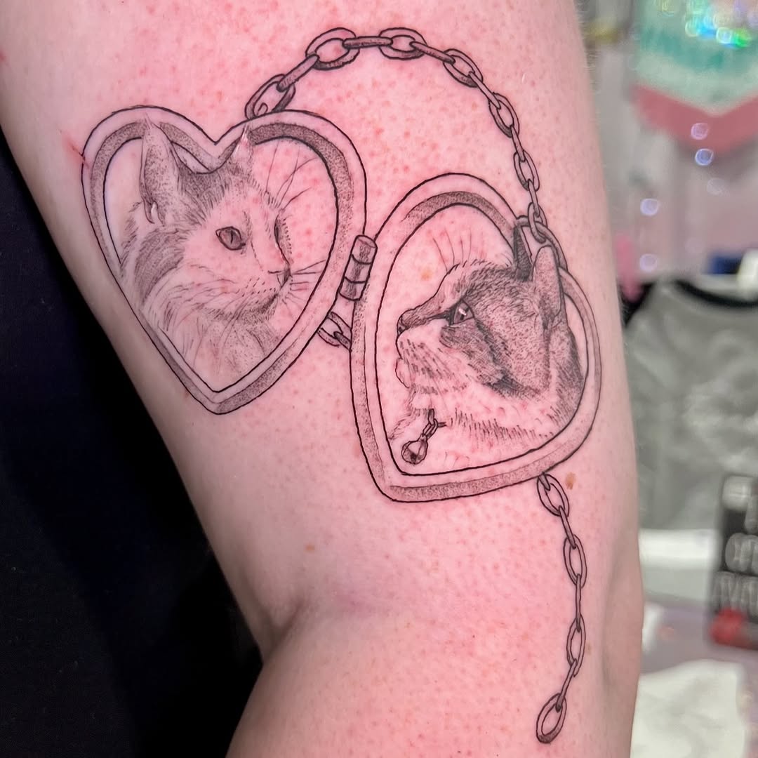Tattoo by @tatts_n_ash โ realism, black_and_grey