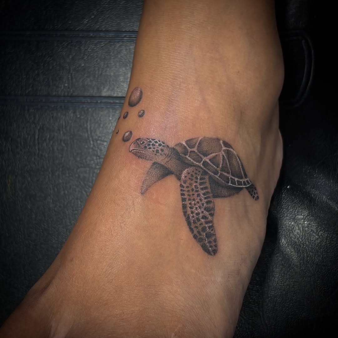 Tattoo by @_stabbygabby โ realism, black_and_grey