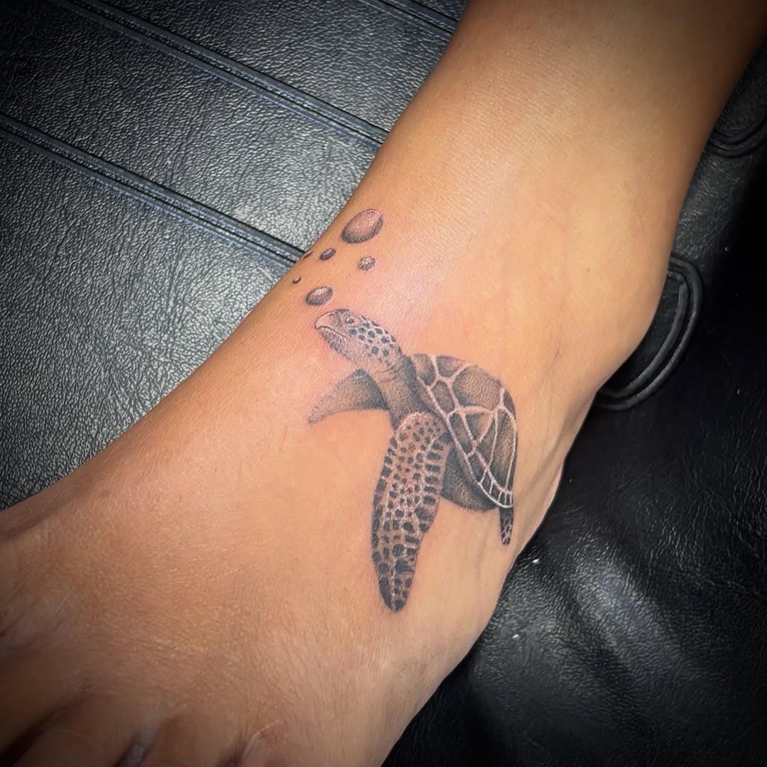 Tattoo by @_stabbygabby โ realism, black_and_grey