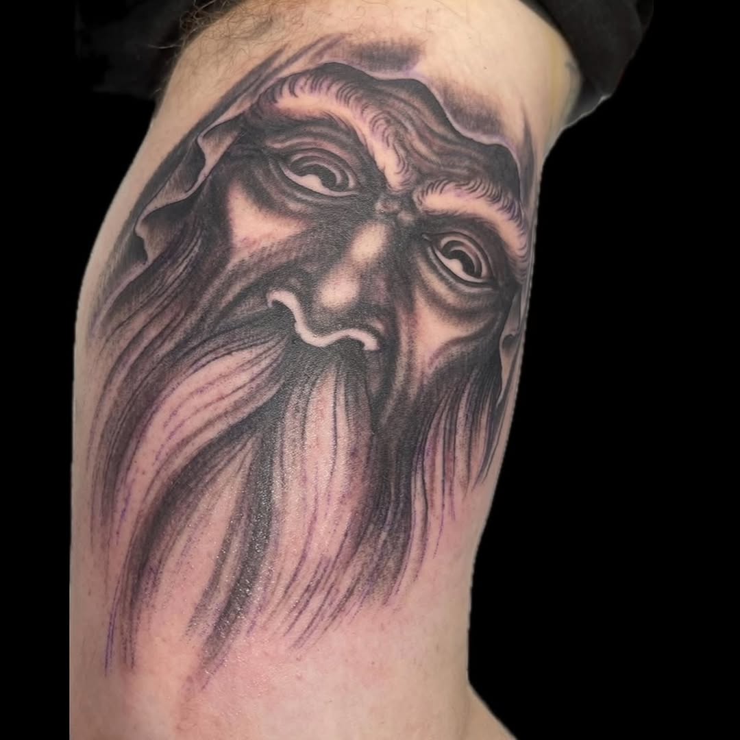 Tattoo by @mikewilsontattoo — realism, black_and_grey
