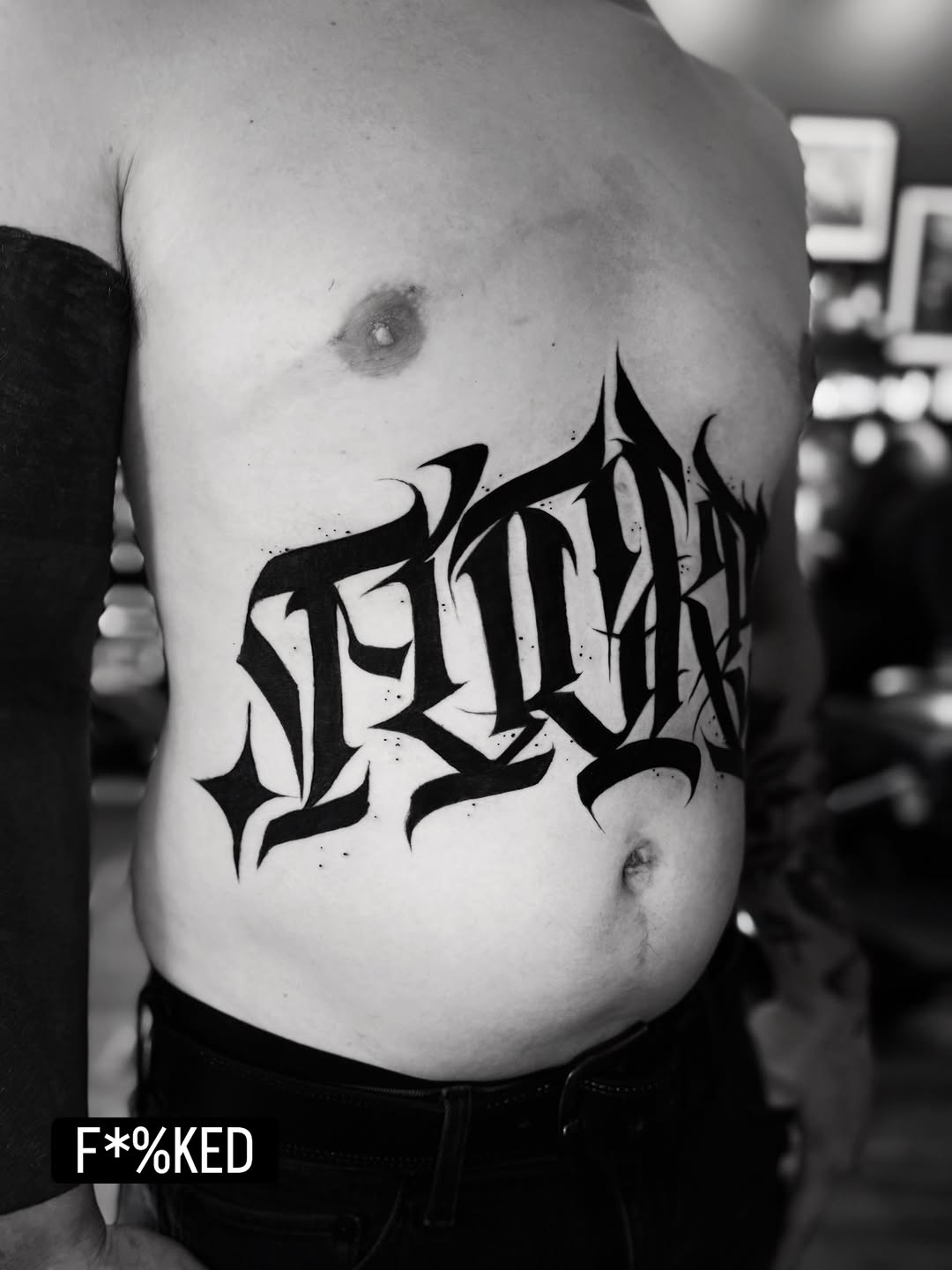 Tattoo by @wiseroner — lettering_script, blackwork