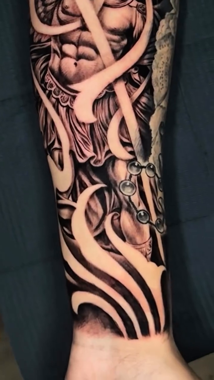 Tattoo by @sherifftattoos — black_and_grey, realism