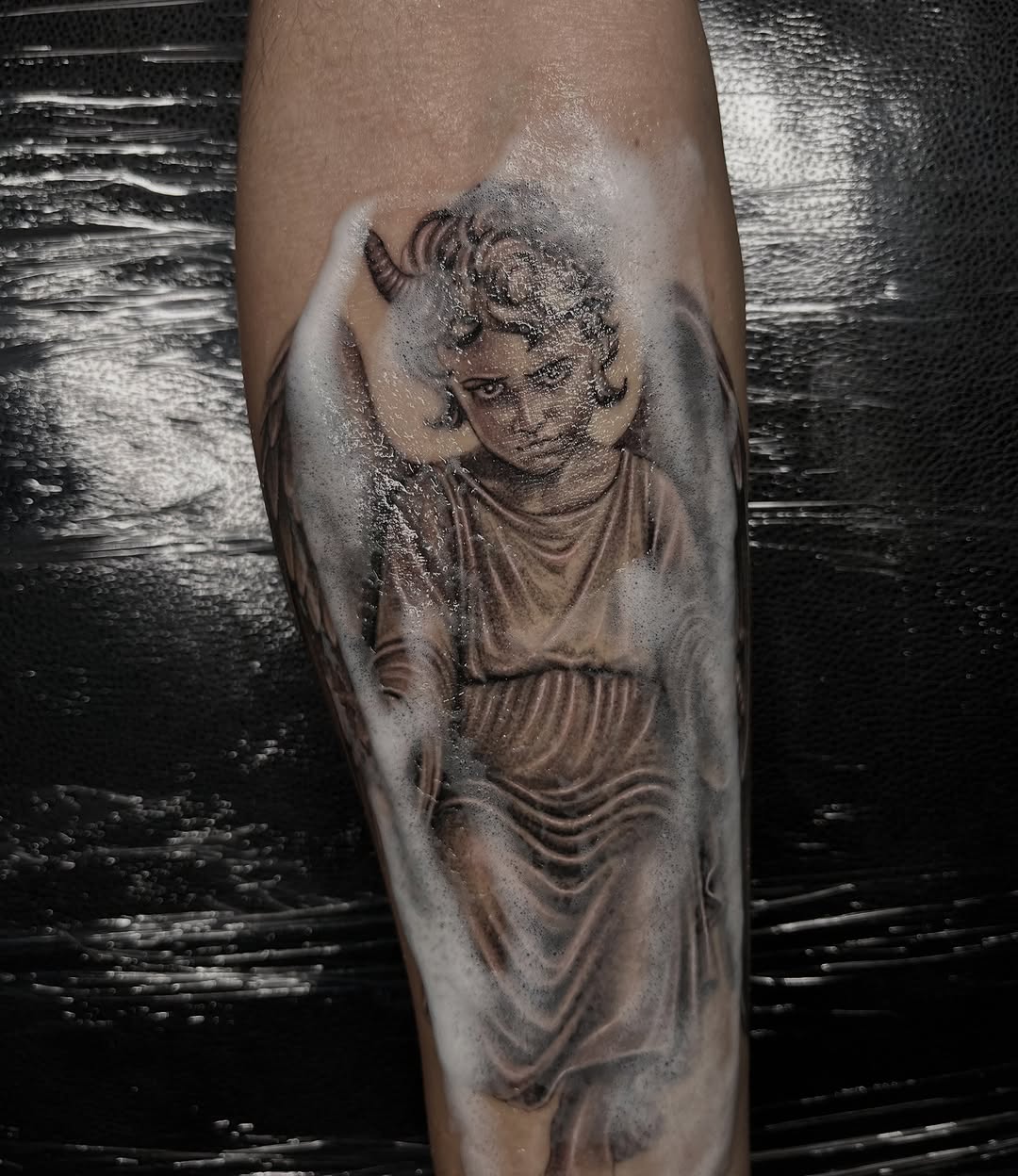 Tattoo by @tattoohaze — realism, black_and_grey