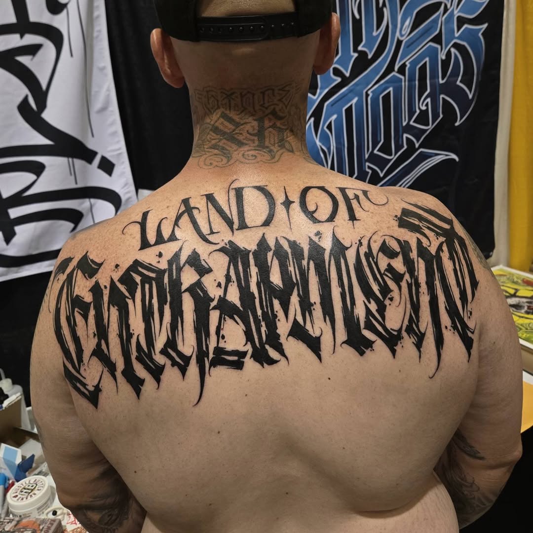Tattoo by @diaztattoos — lettering_script, blackwork