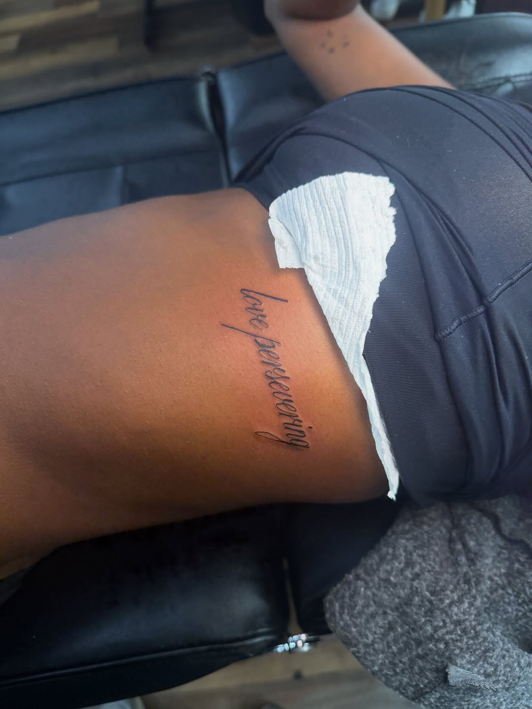 Tattoo by @sarai.inks — lettering_script, fine_line