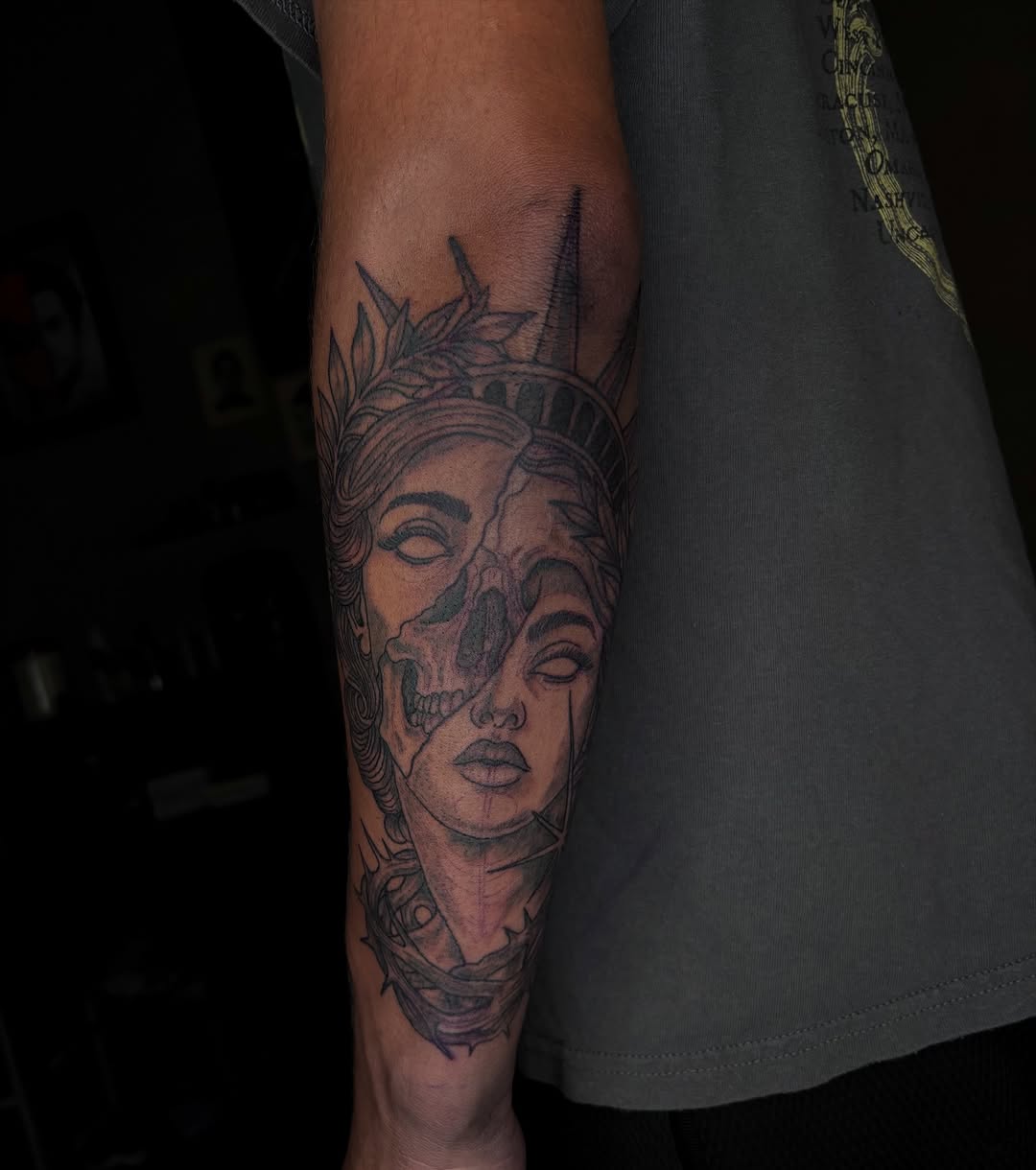Tattoo by @tattman_flair — dark_realism, black_and_grey