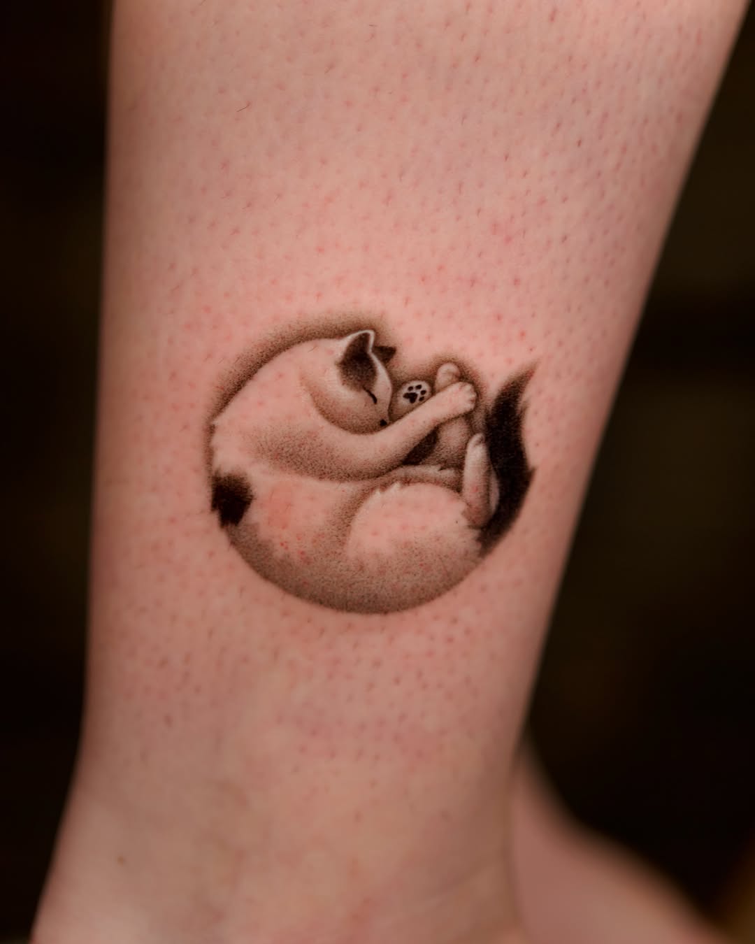 Tattoo by @toki.tattoos โ realism, black_and_grey