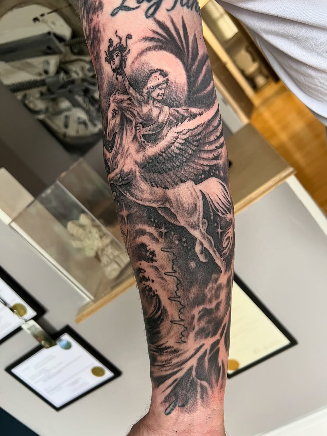 Tattoo by @strikt — black_and_grey, realism