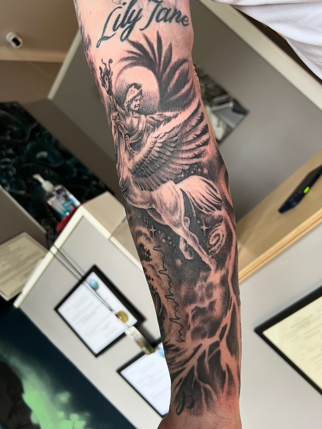 Tattoo by @strikt — black_and_grey, realism