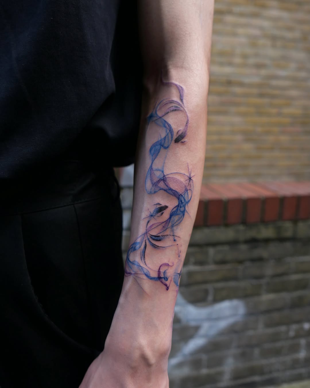 Tattoo by @dowha.tt — watercolor, fine_line