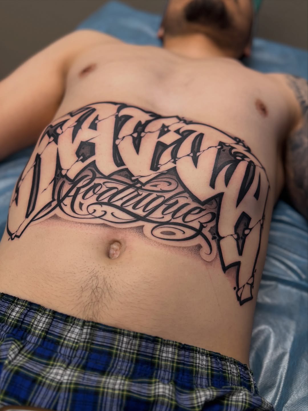 Tattoo by @aleckzi_ramos — lettering_script, chicano