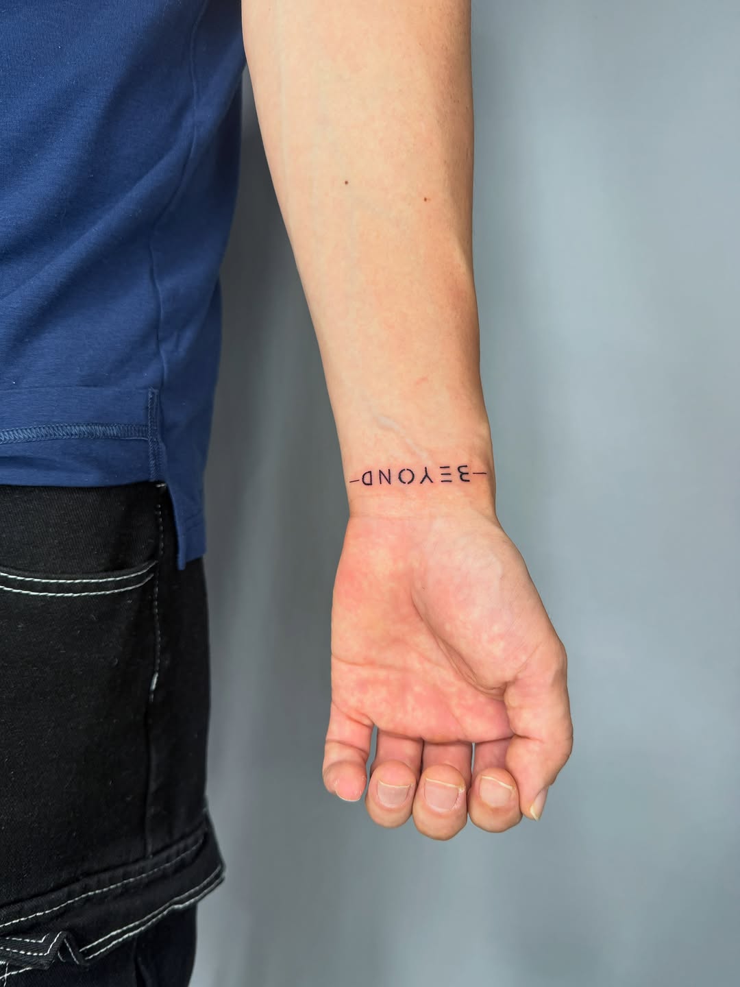 Tattoo by @tizy.inks — lettering_script, fine_line