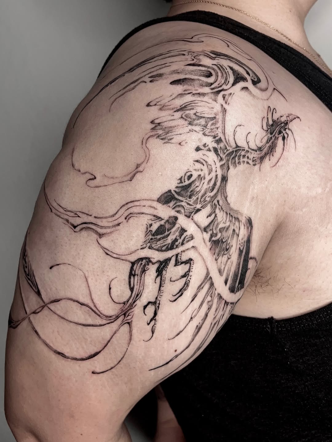 Tattoo by @rayzhu.tattoo — blackwork, illustrative
