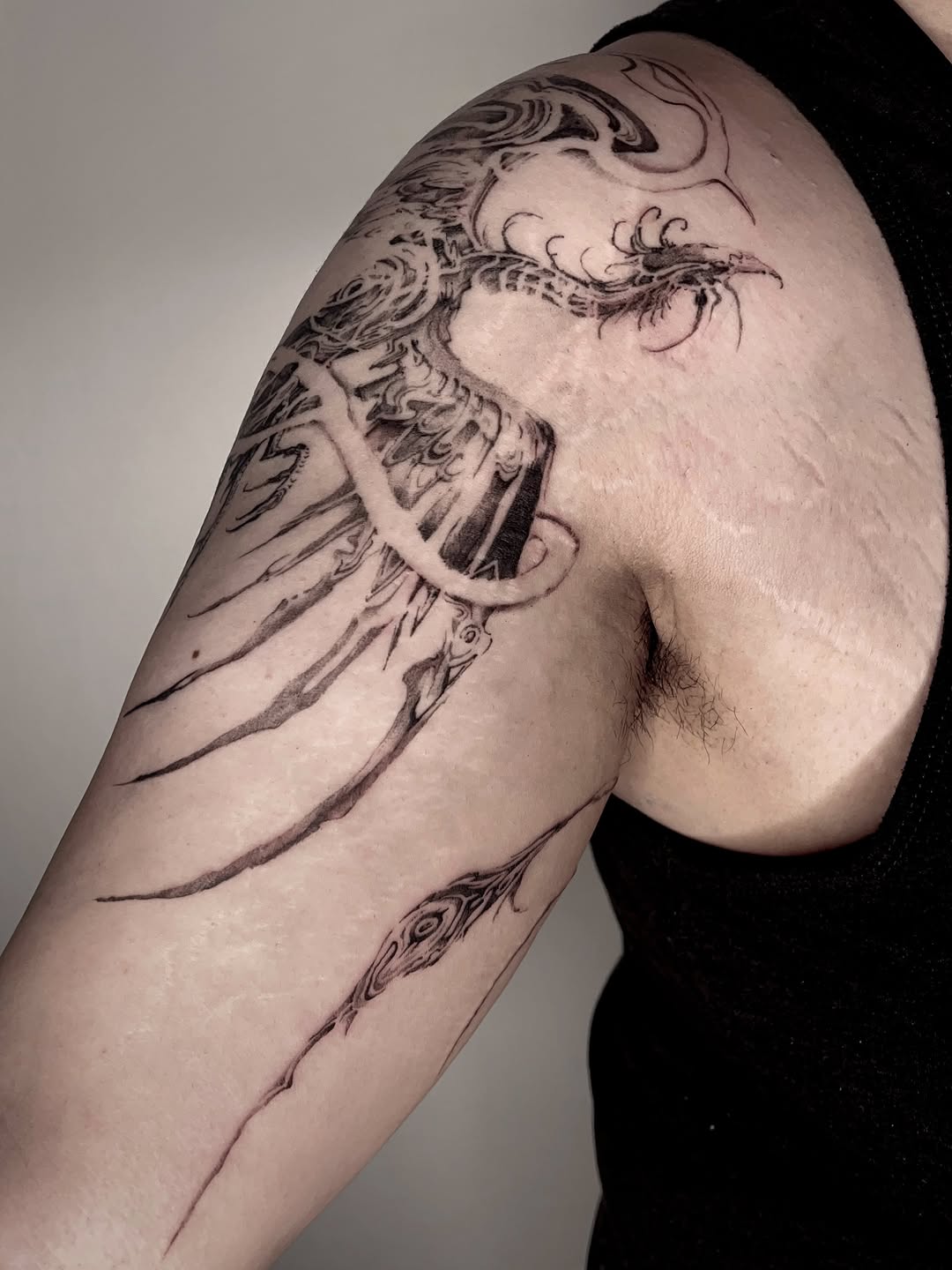 Tattoo by @rayzhu.tattoo — black_and_grey, illustrative