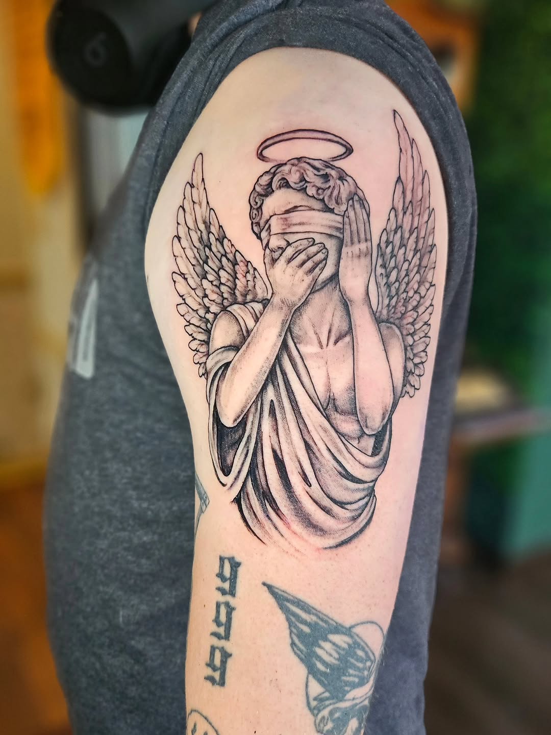 Tattoo by @prettiepluto — black_and_grey, realism