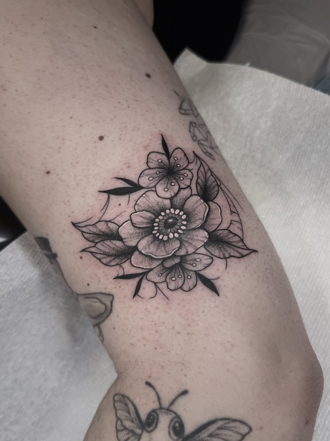 Tattoo by @midnight.spell.art — fine_line, black_and_grey